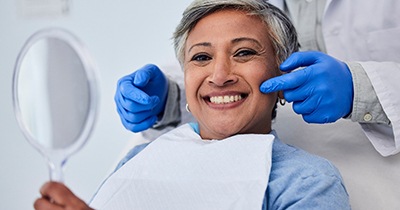 Woman smiling at the dentist’s office